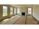 Bright living room features a fireplace and multiple windows with ample natural light at 1440 Ardmore Dr # 343, Sherrills Ford, NC 28673