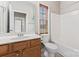 Bathroom features a vanity, toilet, and shower/tub combination, complete with neutral colors and ample lighting at 145 Mcbride Dr, Rockwell, NC 28138