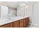 Bathroom with dual sinks and vanities, large mirror and combination tub/shower at 145 Mcbride Dr, Rockwell, NC 28138