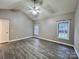 Primary bedroom offers ample space with lots of natural light from two windows at 145 Mcbride Dr, Rockwell, NC 28138