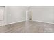 This bedroom is bright with neutral walls and wood look floors throughout at 145 Mcbride Dr, Rockwell, NC 28138