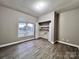 Bedroom with laminate flooring, a window, and closet space at 145 Mcbride Dr, Rockwell, NC 28138