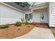 Inviting front porch with brick steps and landscaped flowerbeds enhances this home's curb appeal at 145 Mcbride Dr, Rockwell, NC 28138