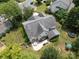 An aerial shot showcases a large backyard with a patio, playground, and lush greenery, perfect for outdoor living at 1800 Robbins Meadows Dr, Waxhaw, NC 28173