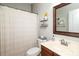 Charming bathroom featuring a shower with curtain, a decorative mirror, and nice decor at 1800 Robbins Meadows Dr, Waxhaw, NC 28173