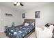 Comfortable bedroom with gray walls, cozy decor and a bed with an elephant print at 1800 Robbins Meadows Dr, Waxhaw, NC 28173