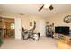 A bedroom with a ceiling fan and an exercise bike for a healthy lifestyle at 1800 Robbins Meadows Dr, Waxhaw, NC 28173