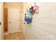 Hallway with hooks and gear hanging on the walls at 1800 Robbins Meadows Dr, Waxhaw, NC 28173