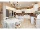 Bright kitchen featuring white cabinetry, stainless steel appliances, and a breakfast nook at 1800 Robbins Meadows Dr, Waxhaw, NC 28173