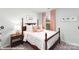 Cozy bedroom featuring a four-poster bed, neutral color scheme, and soft natural light from a window at 200 Parker Claire Ln, Kings Mountain, NC 28086