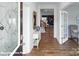 Charming foyer with hardwood floors, a console table, and an open view to the living room at 200 Parker Claire Ln, Kings Mountain, NC 28086