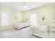 Comfortable bedroom with twin beds, complemented by natural light from two windows at 2010 Creekwood Dr, York, SC 29745