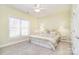 Cozy bedroom with neutral paint, carpet floors, and a large window at 2010 Creekwood Dr, York, SC 29745