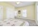 Serene bedroom with carpet, neutral paint, and natural light from the windows at 2010 Creekwood Dr, York, SC 29745