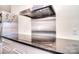 Close-up of a modern cooktop with sleek stainless steel range hood and stylish countertops at 2010 Creekwood Dr, York, SC 29745