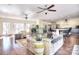 Open concept living area with a combined living room, kitchen, and dining space, filled with light at 2010 Creekwood Dr, York, SC 29745