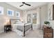 Cozy bedroom featuring a ceiling fan, natural light, carpet flooring, and neutral decor at 2150 Paddlers Cove Dr, Clover, SC 29710