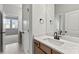 Modern bathroom with white quartz countertop, white trim, and oil-rubbed bronze finishes at 3041 Tramore Dr, Harrisburg, NC 28075