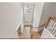 Grand foyer showcasing double doors and a chandelier, creating an inviting entrance at 3041 Tramore Dr, Harrisburg, NC 28075