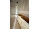 Bathroom featuring a white vanity, cabinets, and a tub with a shower at 317 Maidstone Dr # 57, Monroe, NC 28110