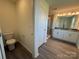 A bathroom with toilet, shower, and double vanity at 317 Maidstone Dr # 57, Monroe, NC 28110