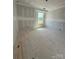Unfinished bedroom with a window at 317 Maidstone Dr # 57, Monroe, NC 28110
