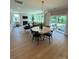 Open concept dining and living area featuring hard wood floors and lots of natural light at 317 Maidstone Dr # 57, Monroe, NC 28110