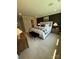 Main bedroom suite with carpet floors, paneled accent wall, and contemporary furnishings at 317 Maidstone Dr # 57, Monroe, NC 28110