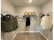 Bright and airy walk-in closet, maximizing organization with adjustable shelving and ample hanging space at 317 Maidstone Dr # 57, Monroe, NC 28110