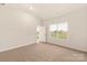 Cozy bedroom with neutral carpeting, large window, and a view of the outdoors at 3246 Maple Ridge Dr, Gastonia, NC 28052