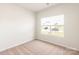 Bright, empty bedroom with a neutral carpet and a window providing natural light at 3335 Burberry Dr, Gastonia, NC 28052