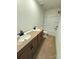 Bathroom featuring double sinks, wood cabinets, and a shower-tub combo at 346 Knotty Wood Dr # 71, Monroe, NC 28110
