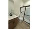Modern bathroom featuring a large shower, updated vanity with white sink, and black hardware at 346 Knotty Wood Dr # 71, Monroe, NC 28110
