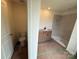 Elegant bathroom showcasing contemporary fixtures and a separate toilet area, enhancing privacy at 346 Knotty Wood Dr # 71, Monroe, NC 28110
