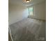 Cozy bedroom offers plush carpeting, a window, and is ready for personalization at 346 Knotty Wood Dr # 71, Monroe, NC 28110