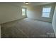 A spacious bedroom with neutral carpet and serene atmosphere for peaceful relaxation at 346 Knotty Wood Dr # 71, Monroe, NC 28110