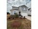 Charming two-story home with a two-car garage and beautifully designed landscaping at 346 Knotty Wood Dr # 71, Monroe, NC 28110