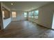 Open-concept living room with beautiful wood floors, recessed lighting, and plenty of natural light at 346 Knotty Wood Dr # 71, Monroe, NC 28110