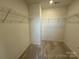 Spacious walk-in closet with ample storage space and metal shelving for organized clothing and accessories at 346 Knotty Wood Dr # 71, Monroe, NC 28110