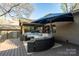 Expansive backyard deck featuring outdoor seating area and barbecue area perfect for entertaining at 4313 Kingswood Rd, Charlotte, NC 28226