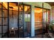 This bathroom features a glass enclosed shower and a view into the sauna with wood ceilings and an additional window at 4313 Kingswood Rd, Charlotte, NC 28226