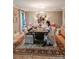 Elegant dining room featuring stylish lighting, hardwood floors, and neutral decor at 4313 Kingswood Rd, Charlotte, NC 28226