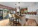 Bright kitchen featuring modern appliances, a center island, and hardwood floors at 4313 Kingswood Rd, Charlotte, NC 28226
