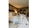 Comfortable primary bedroom featuring a large bed, neutral decor, and natural light with access to outdoors at 4313 Kingswood Rd, Charlotte, NC 28226