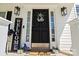 Close-up of a stylish front door with decorative accents and sidelights at 6019 Timbertop Ln, Charlotte, NC 28215