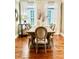 Dining room featuring a table with seating for six, hardwood floors and lots of natural light at 735 Amalfi Dr, Davidson, NC 28036