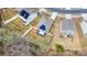 An aerial view of a home with solar panels and a fenced backyard at 10500 Bradstreet Commons Way, Charlotte, NC 28215