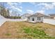 A fully fenced backyard with a small patio area at 10500 Bradstreet Commons Way, Charlotte, NC 28215