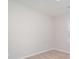 Simple bedroom with neutral carpet, white walls, and a window allowing for natural light at 10500 Bradstreet Commons Way, Charlotte, NC 28215