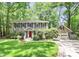 Charming two-story home with a well-manicured lawn, attached garage, and beautiful landscape at 11 Tanglewood Rd, Lake Wylie, SC 29710